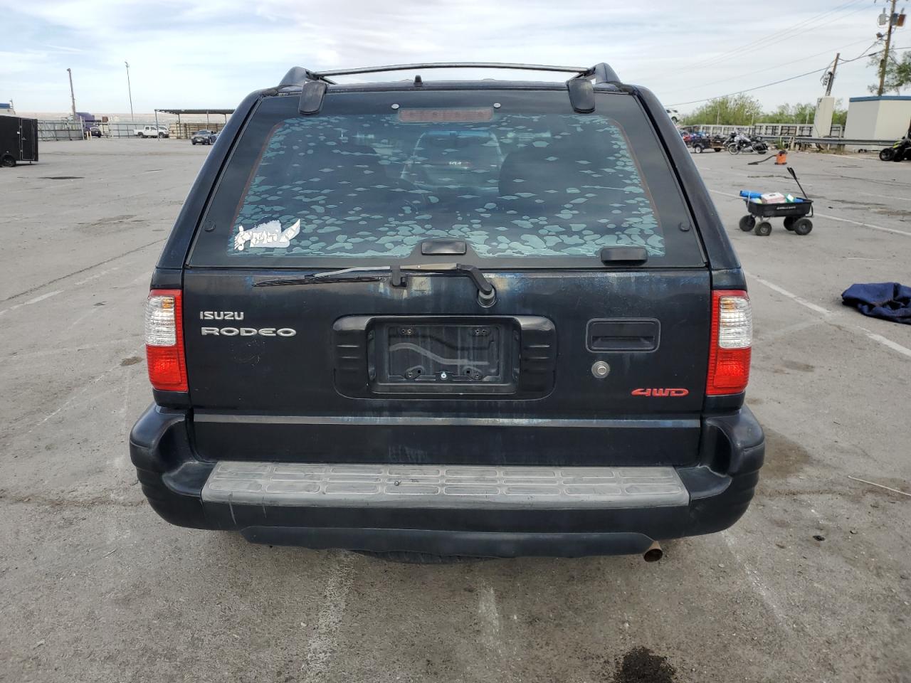 2001 Isuzu Rodeo S VIN: 4S2DM58W514349522 Lot: 57435874