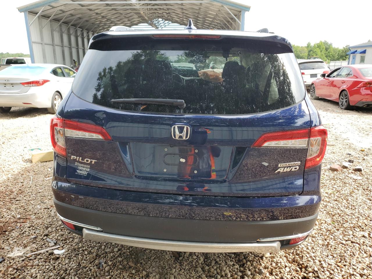 2022 Honda Pilot Touring VIN: 5FNYF6H94NB013107 Lot: 58752304