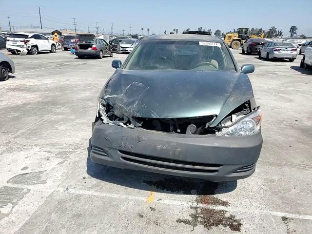 2004 Toyota Camry Le VIN: JTDBE32K340259761 Lot: 59590774