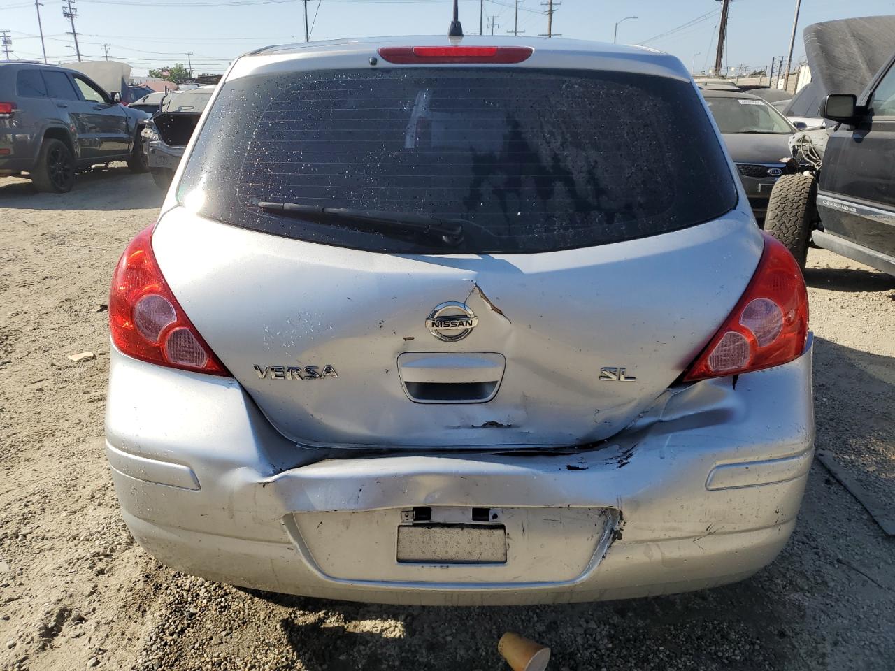 2009 Nissan Versa S VIN: 3N1BC13E39L410131 Lot: 60672904