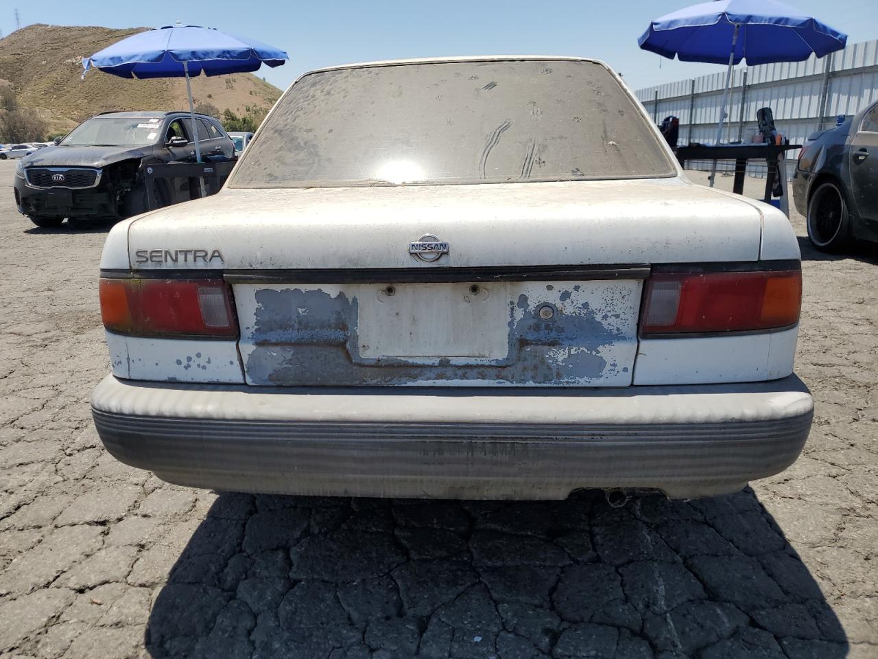 1991 Nissan Sentra VIN: 1N4EB32A0MC734915 Lot: 58585404