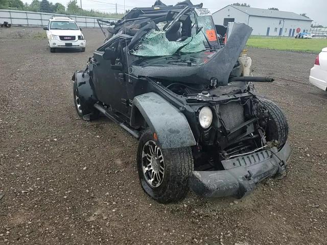 2011 Jeep Wrangler Sport VIN: 1J4AA2D13BL593493 Lot: 60802804