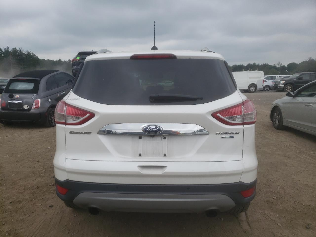 2016 Ford Escape Titanium VIN: 1FMCU9JX9GUA36141 Lot: 57300474