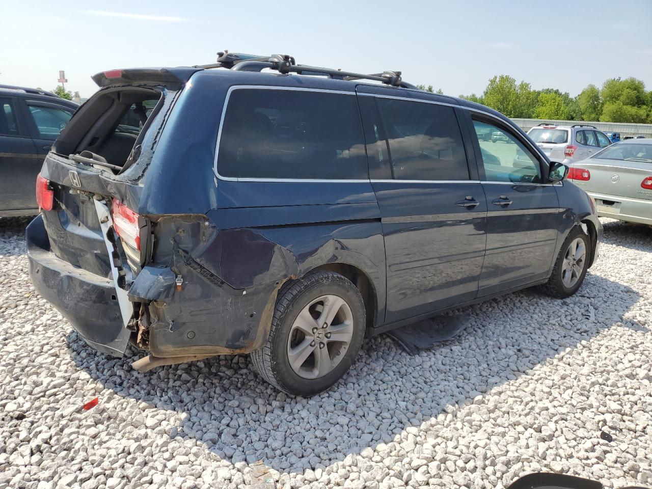 2010 Honda Odyssey Touring VIN: 5FNRL3H9XAB058879 Lot: 57667184