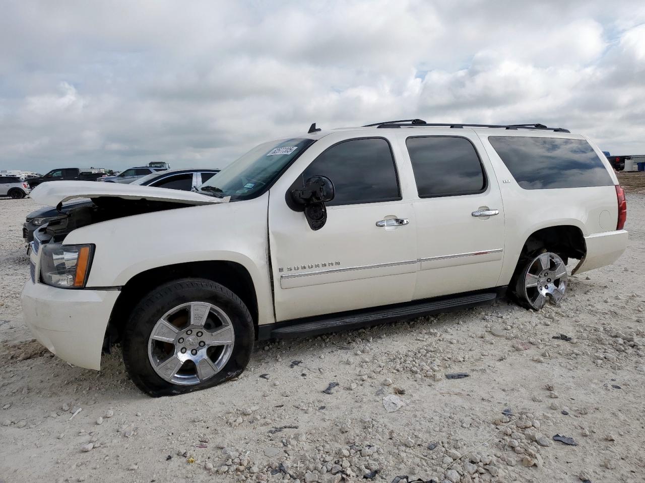 CHEVROLET SUBURBAN 2009 1GNFC36039R217259
