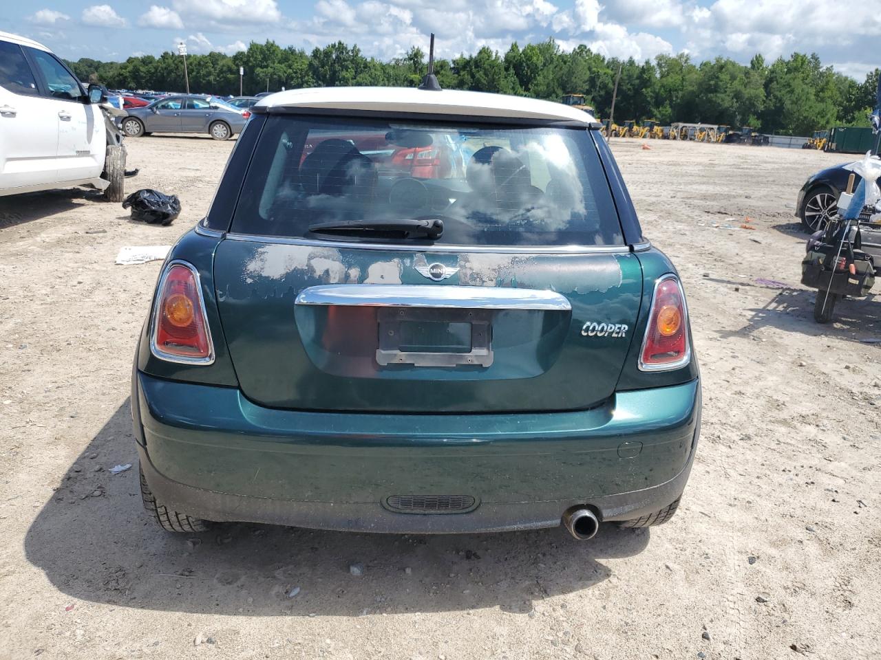 2010 Mini Cooper VIN: WMWMF3C5XATU77721 Lot: 62646495
