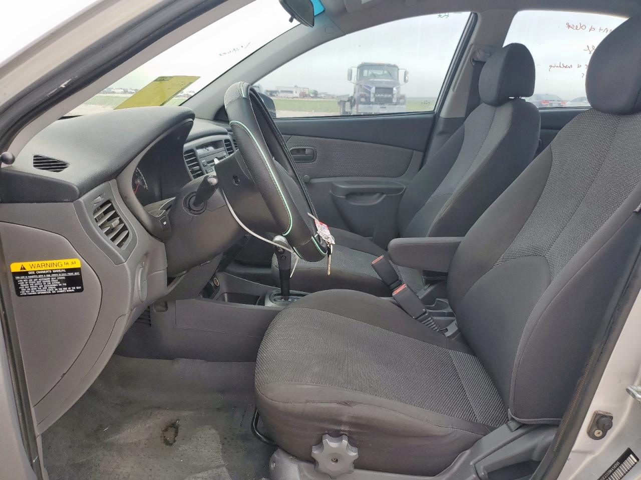 2009 Kia Rio Base VIN: KNADE223396458595 Lot: 62408455