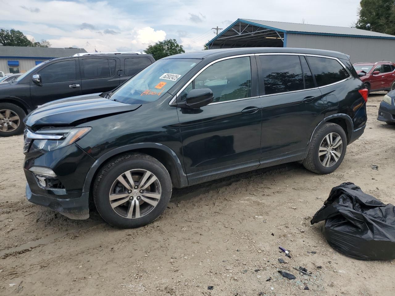 HONDA PILOT 2016 VIN 5FNYF6H57GB082826