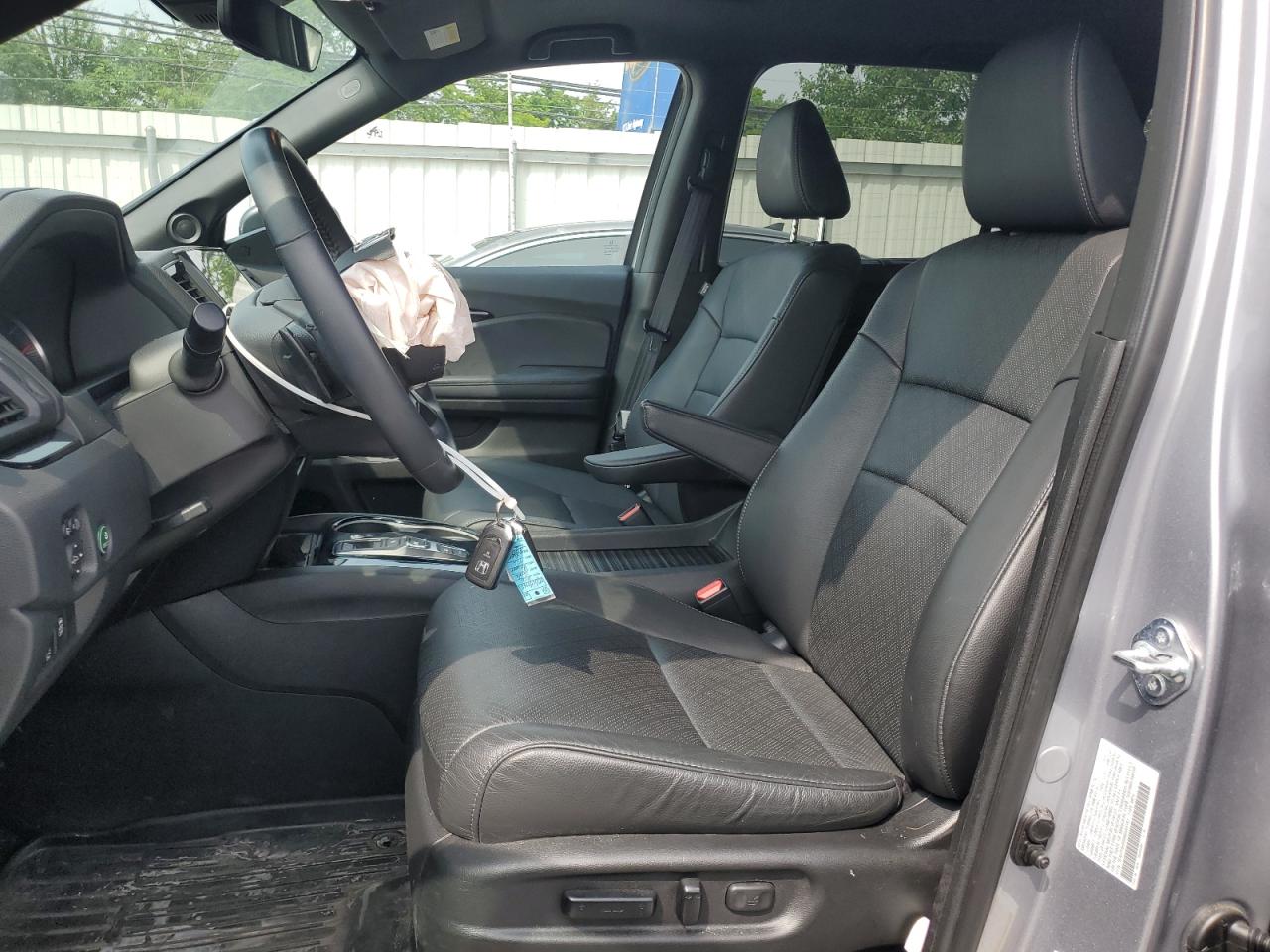 2021 Honda Passport Touring VIN: 5FNYF8H95MB040147 Lot: 59796975