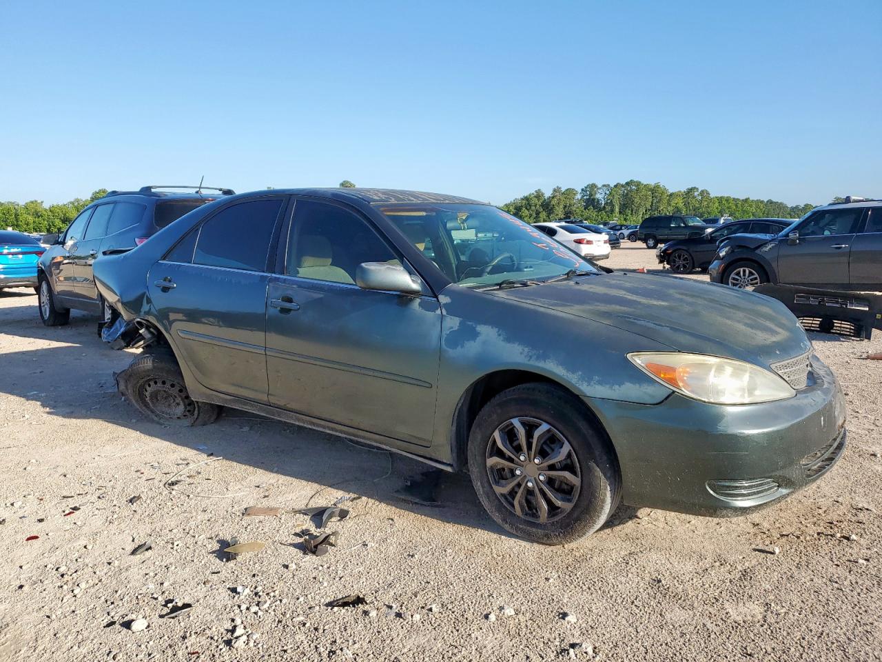 TOYOTA CAMRY 2002 VIN 4T1BE32KX2U613048 photo 4