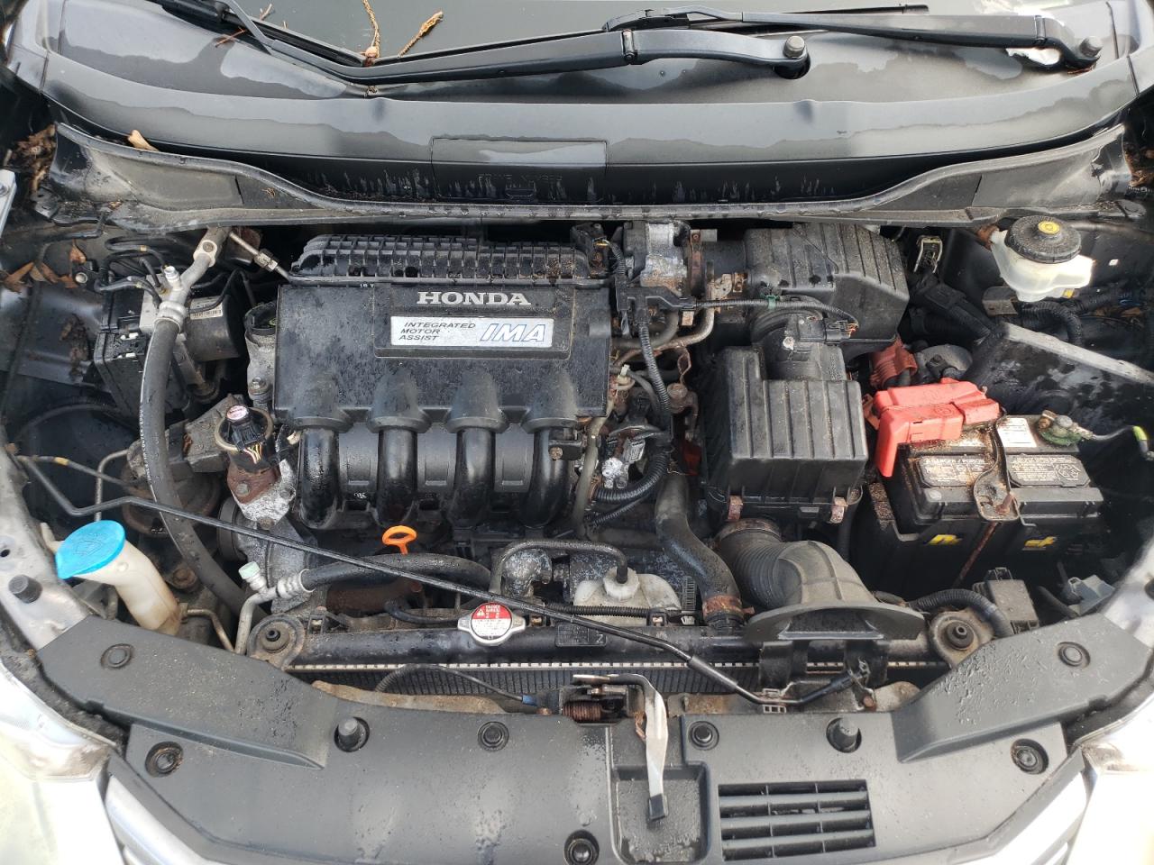 2010 Honda Insight Ex VIN: JHMZE2H77AS032566 Lot: 61204385