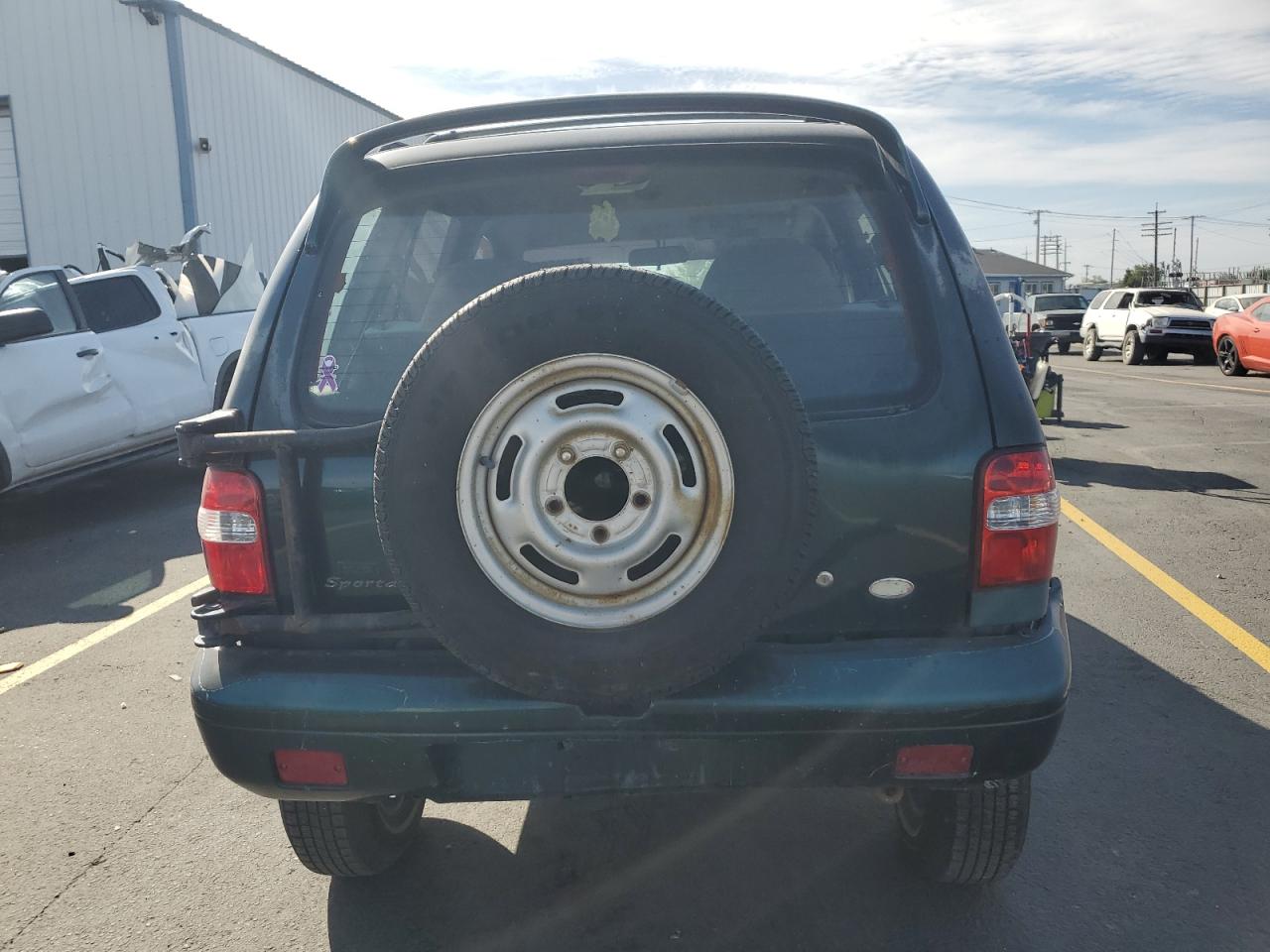 1998 Kia Sportage VIN: KNDJA7233W5555067 Lot: 62295655