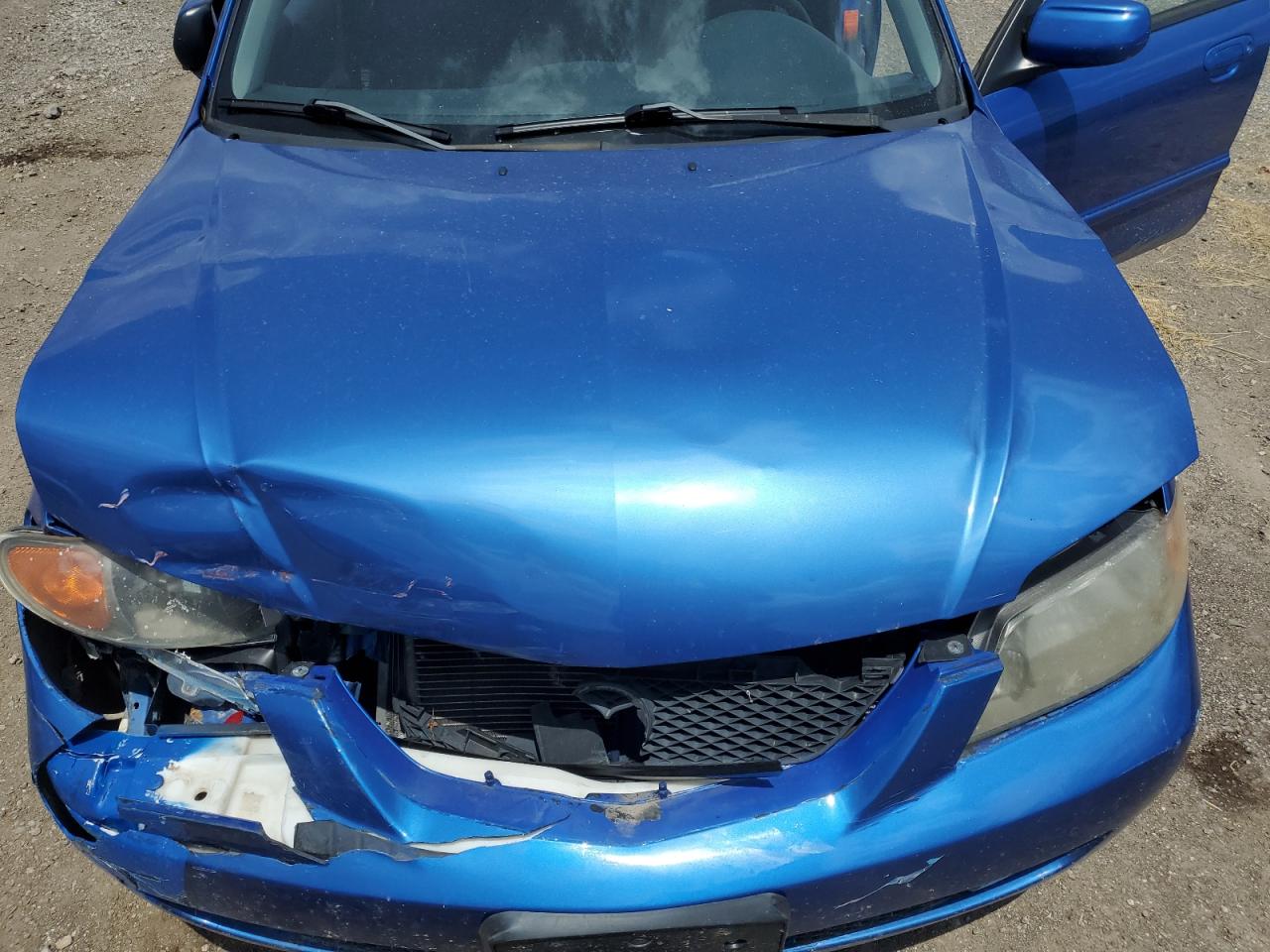 2003 Mazda Protege Dx VIN: JM1BJ226731170700 Lot: 62024475