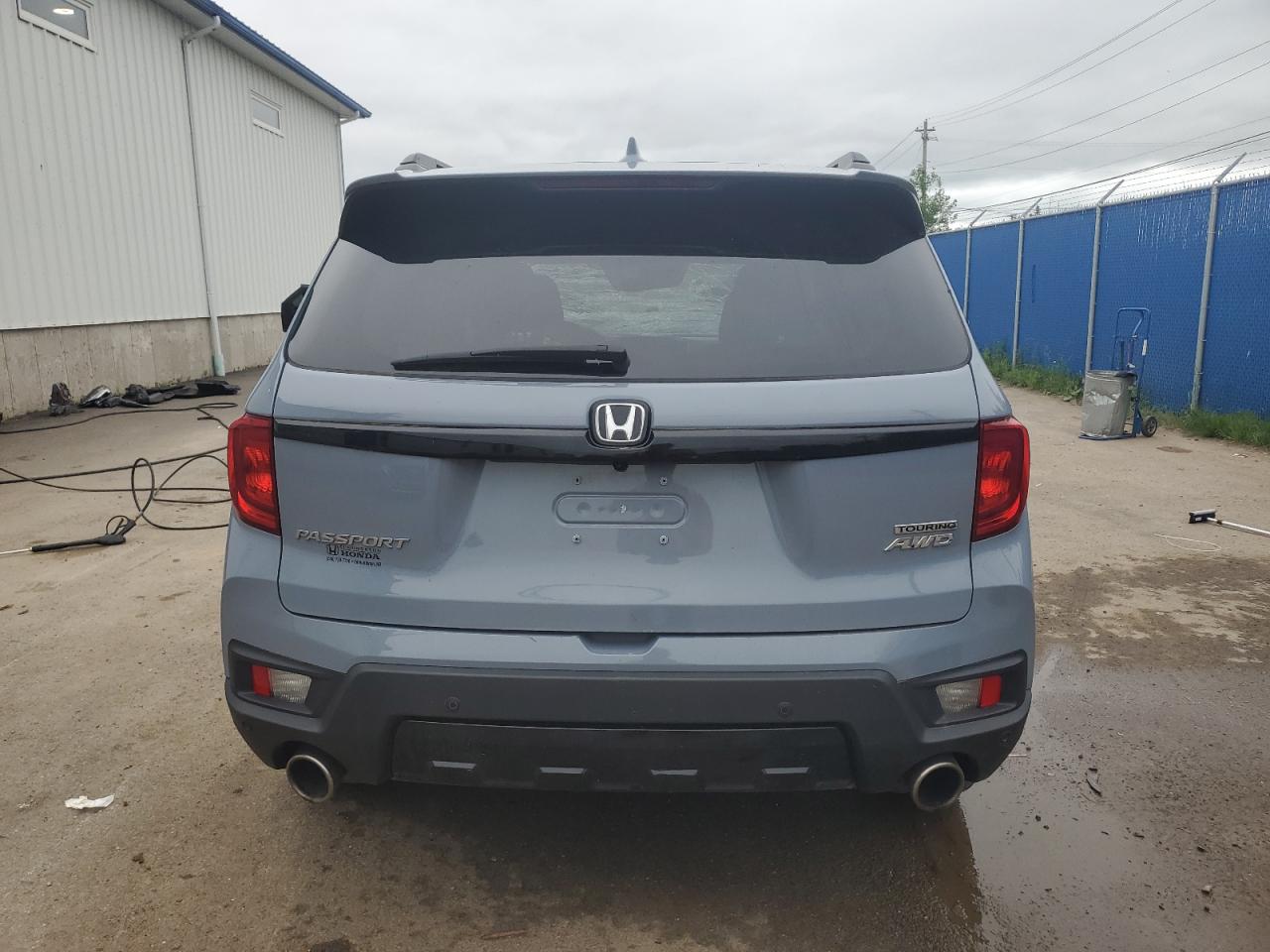 2022 Honda Passport Touring VIN: 5FNYF8H95NB502109 Lot: 61561385