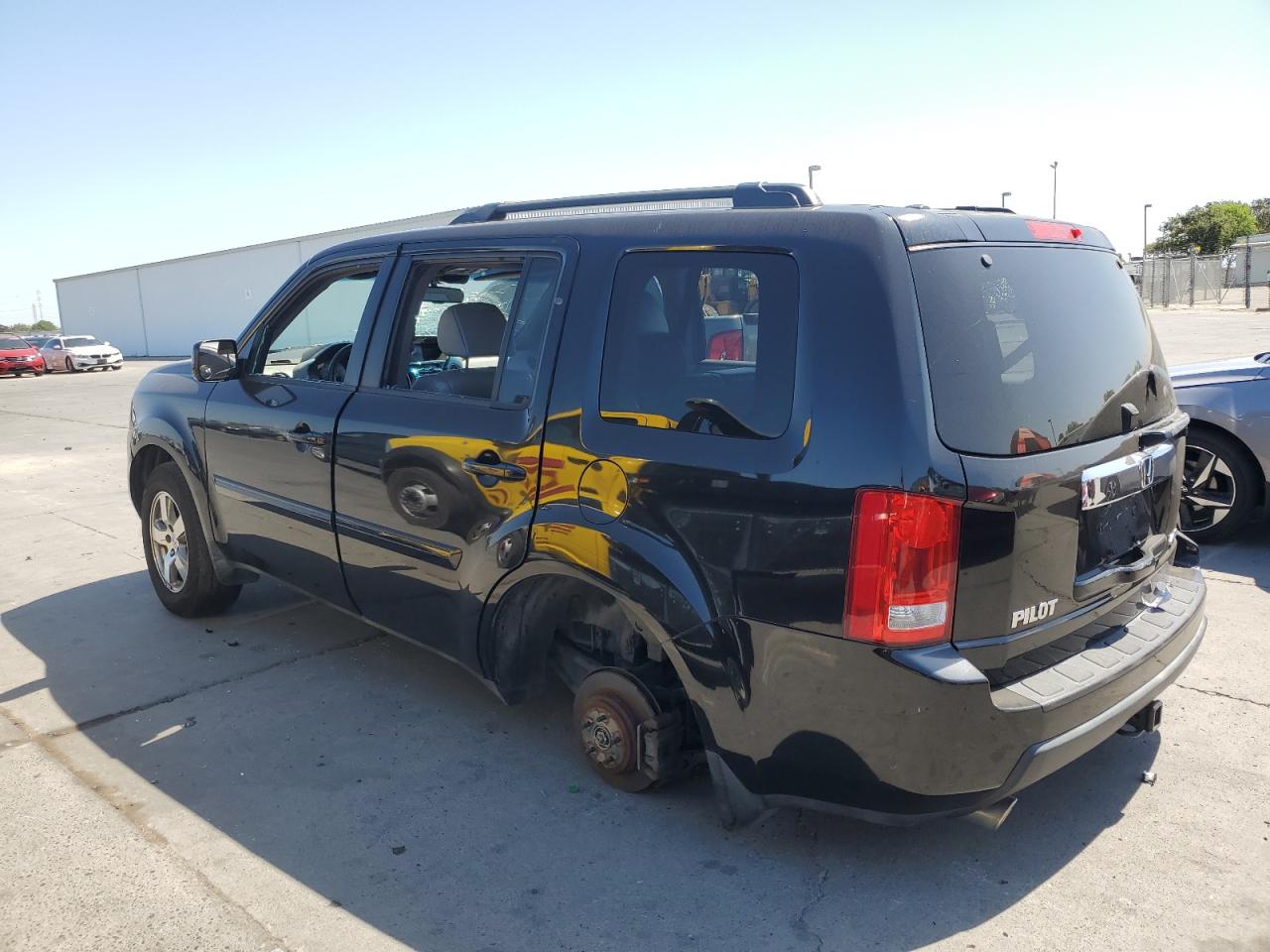 2011 Honda Pilot Exln VIN: 5FNYF4H74BB010433 Lot: 63043845