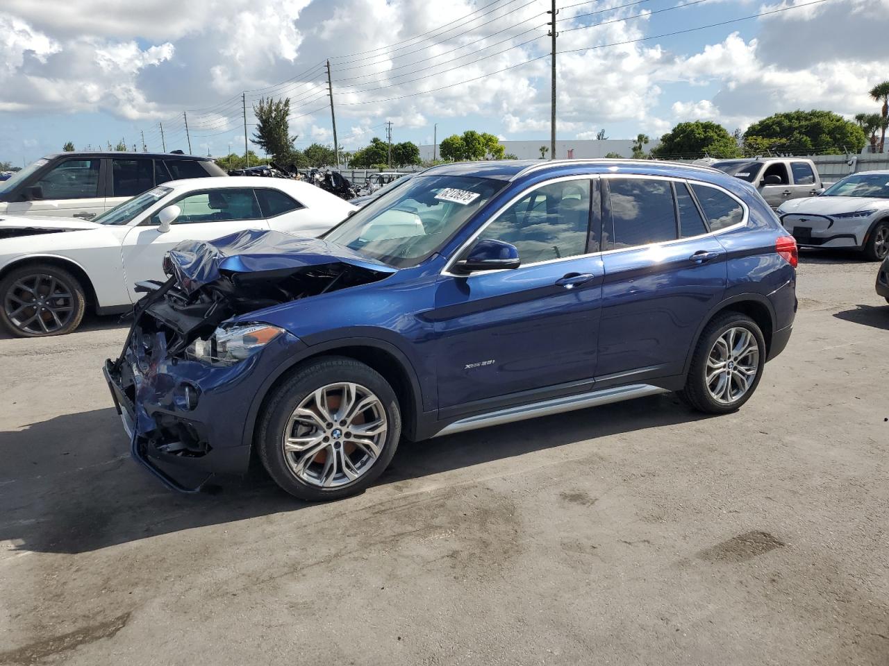 2017 BMW X1 xDrive28I blue suv gas WBXHT3C36H5F82630 photo #1