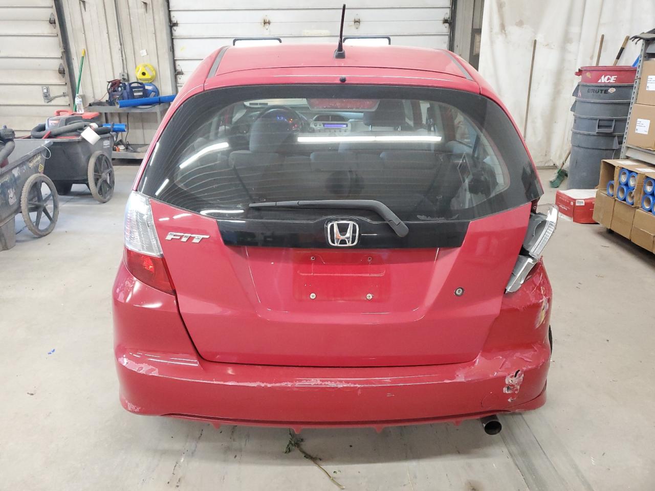 2010 Honda Fit VIN: JHMGE8H20AC009557 Lot: 61441005