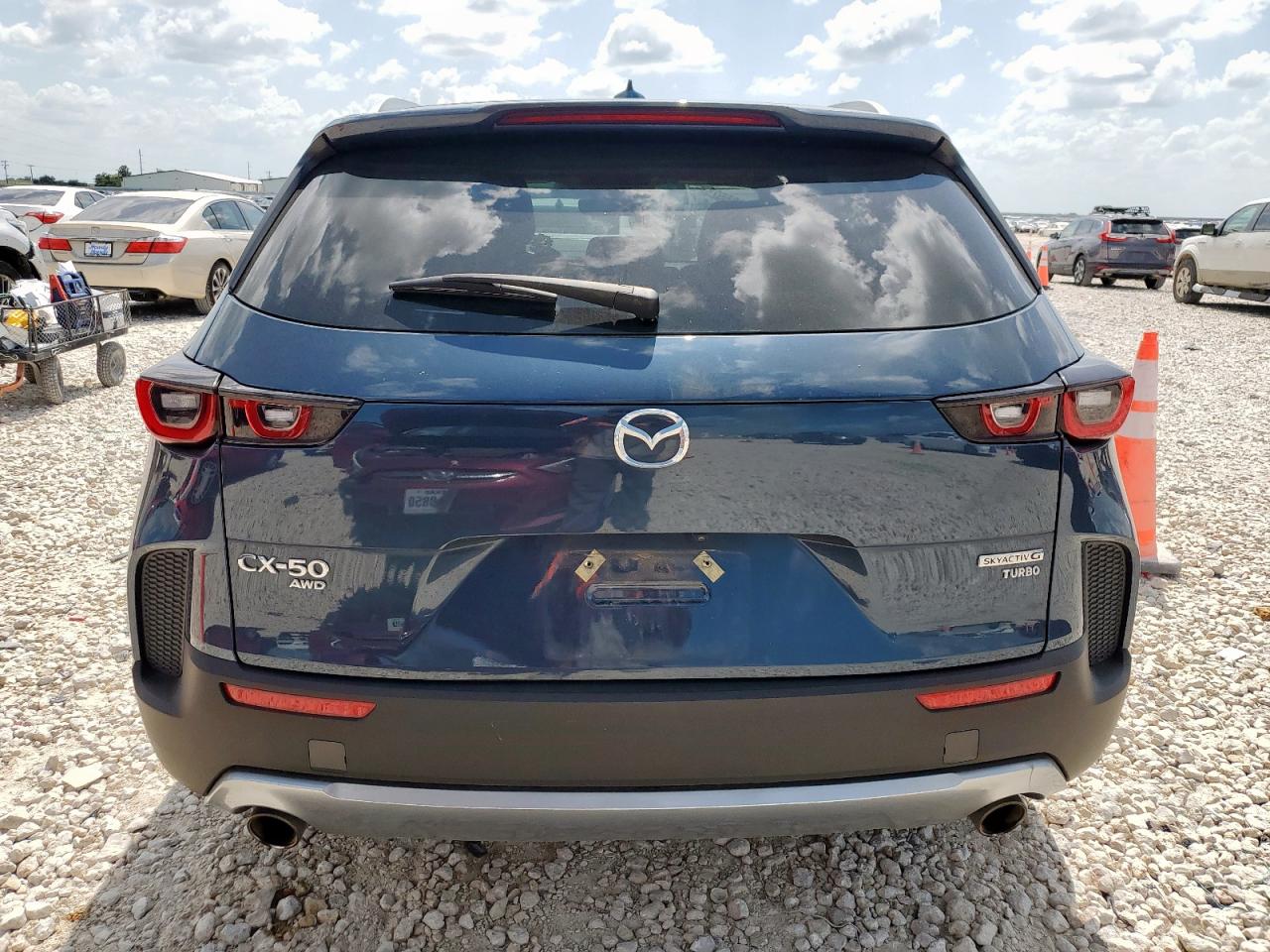2023 Mazda Cx-50 Premium VIN: 7MMVABDY7PN142745 Lot: 62065525