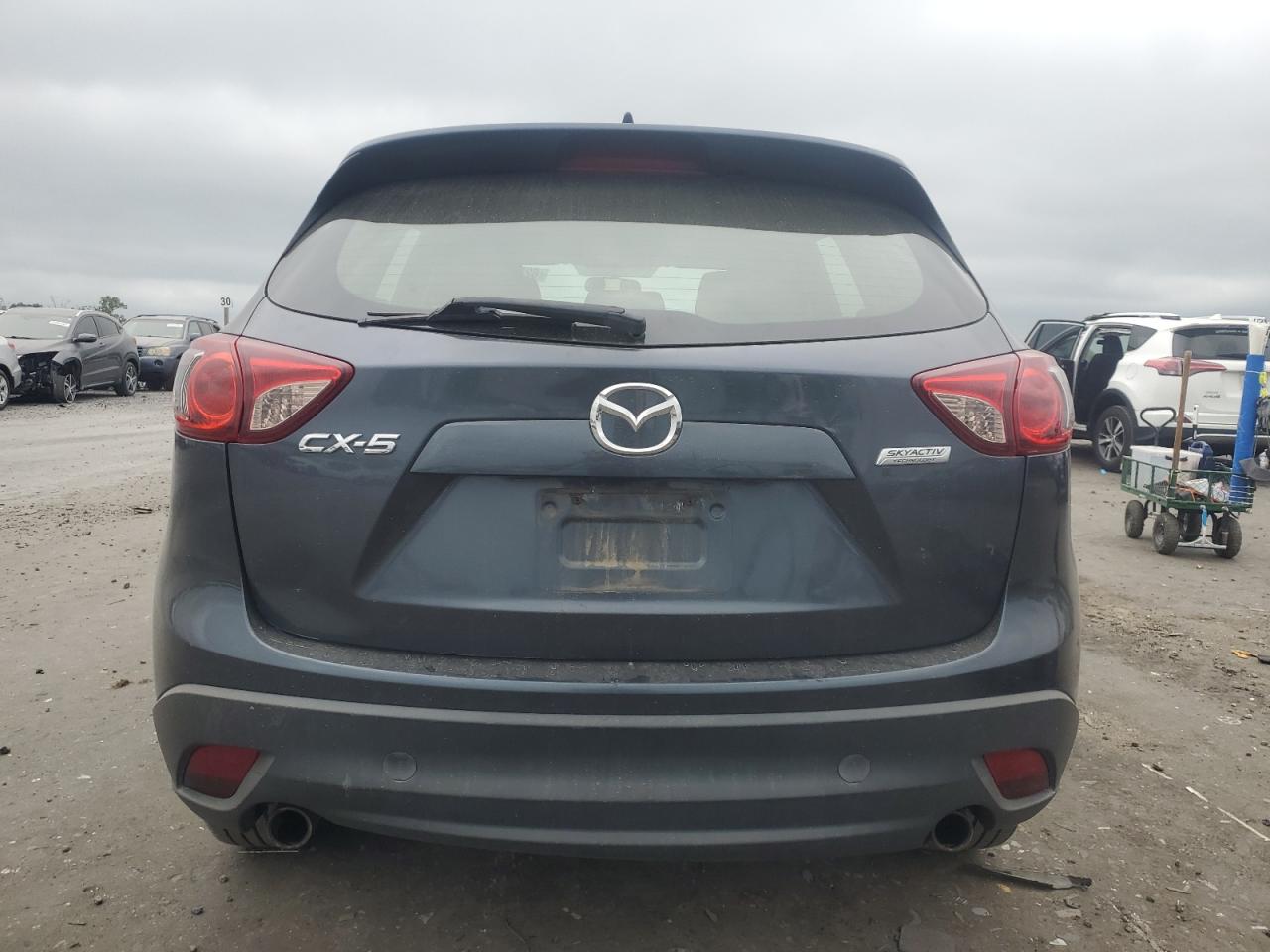 2013 Mazda Cx-5 Sport VIN: JM3KE2BE9D0121136 Lot: 62326055
