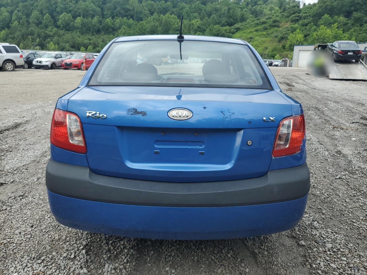 2009 Kia Rio Base VIN: KNADE223996489754 Lot: 61671205