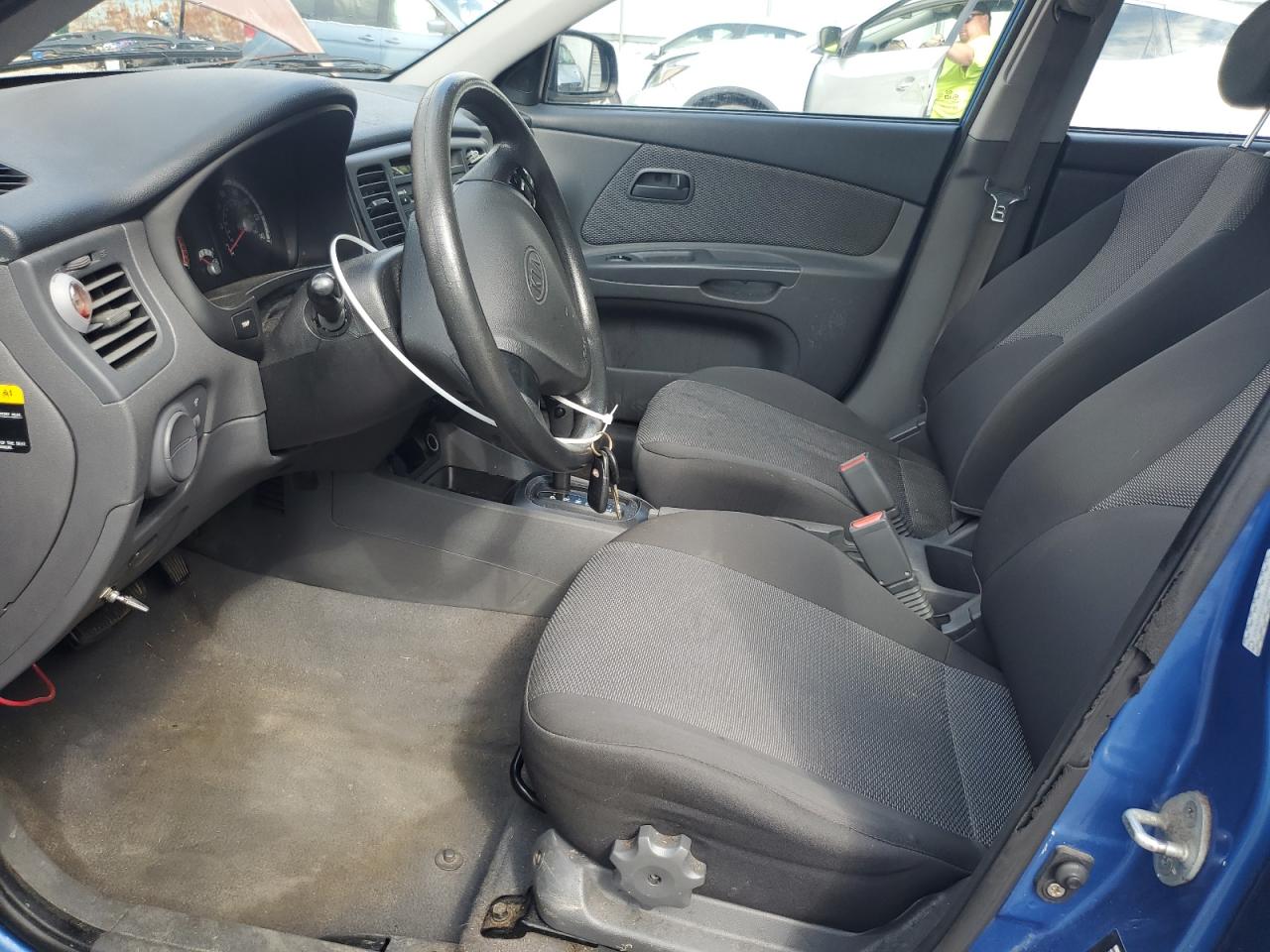 2009 Kia Rio Base VIN: KNADE223996489754 Lot: 61671205