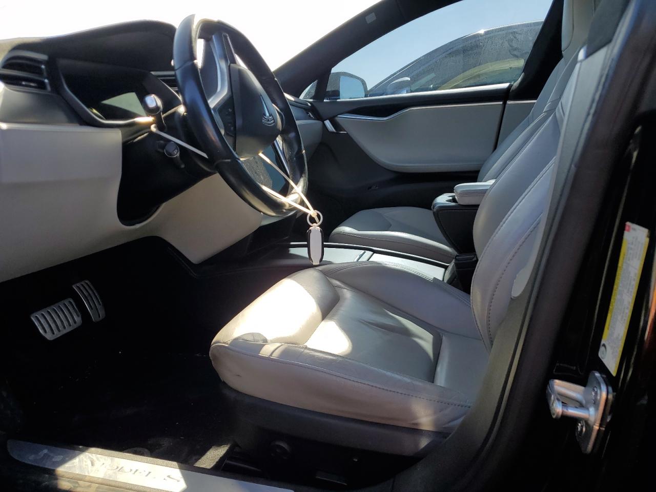 2016 Tesla Model S VIN: 5YJSA1E45GF142105 Lot: 61442395
