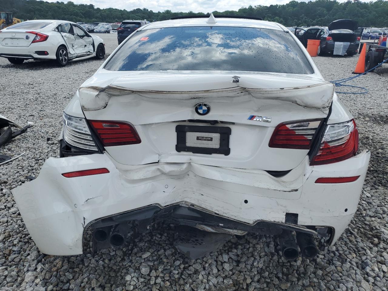 2015 BMW M5 VIN: WBSFV9C54FD594416 Lot: 60411195