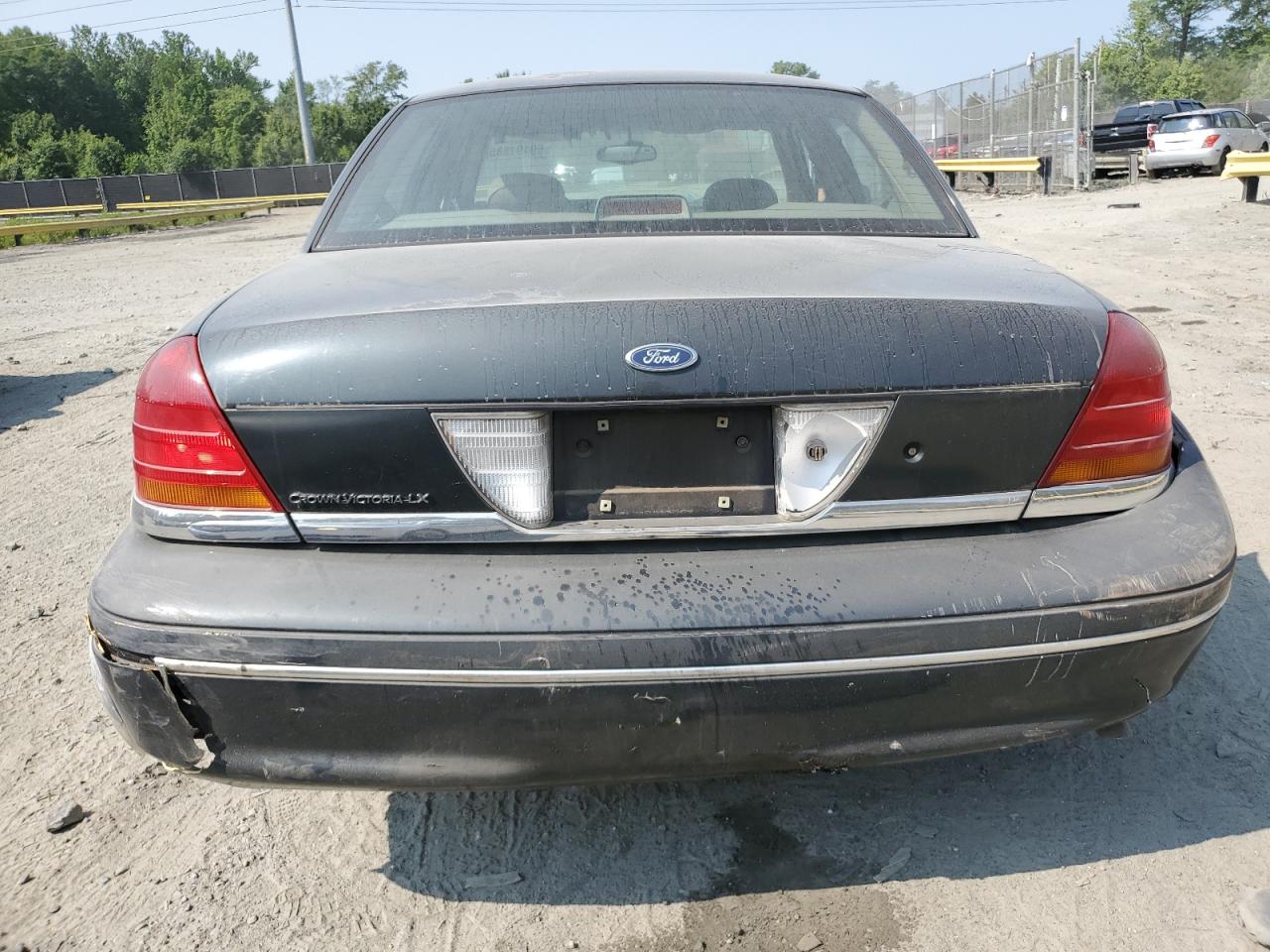 1999 Ford Crown Victoria Lx VIN: 2FAFP74W8XX125486 Lot: 59191885