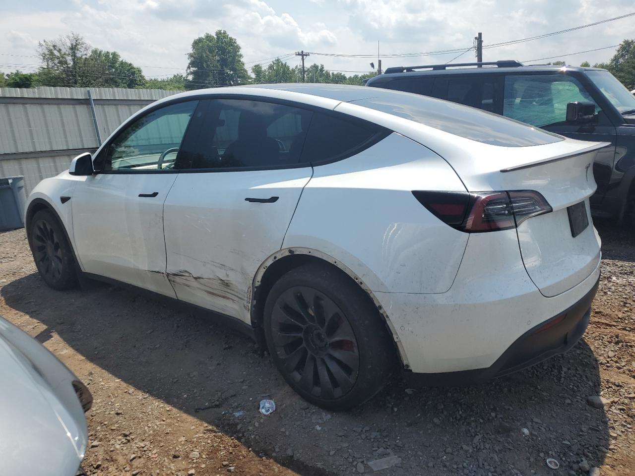 2022 Tesla Model Y VIN: 7SAYGDEF2NF540058 Lot: 63110375
