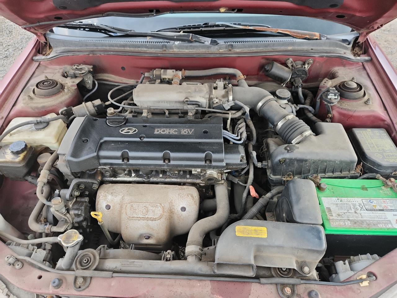 1999 Hyundai Elantra Base VIN: KMHJF25F6XU833540 Lot: 63153215