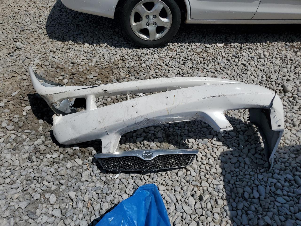 2000 Mazda Protege Dx VIN: JM1BJ2224Y0203582 Lot: 62561055