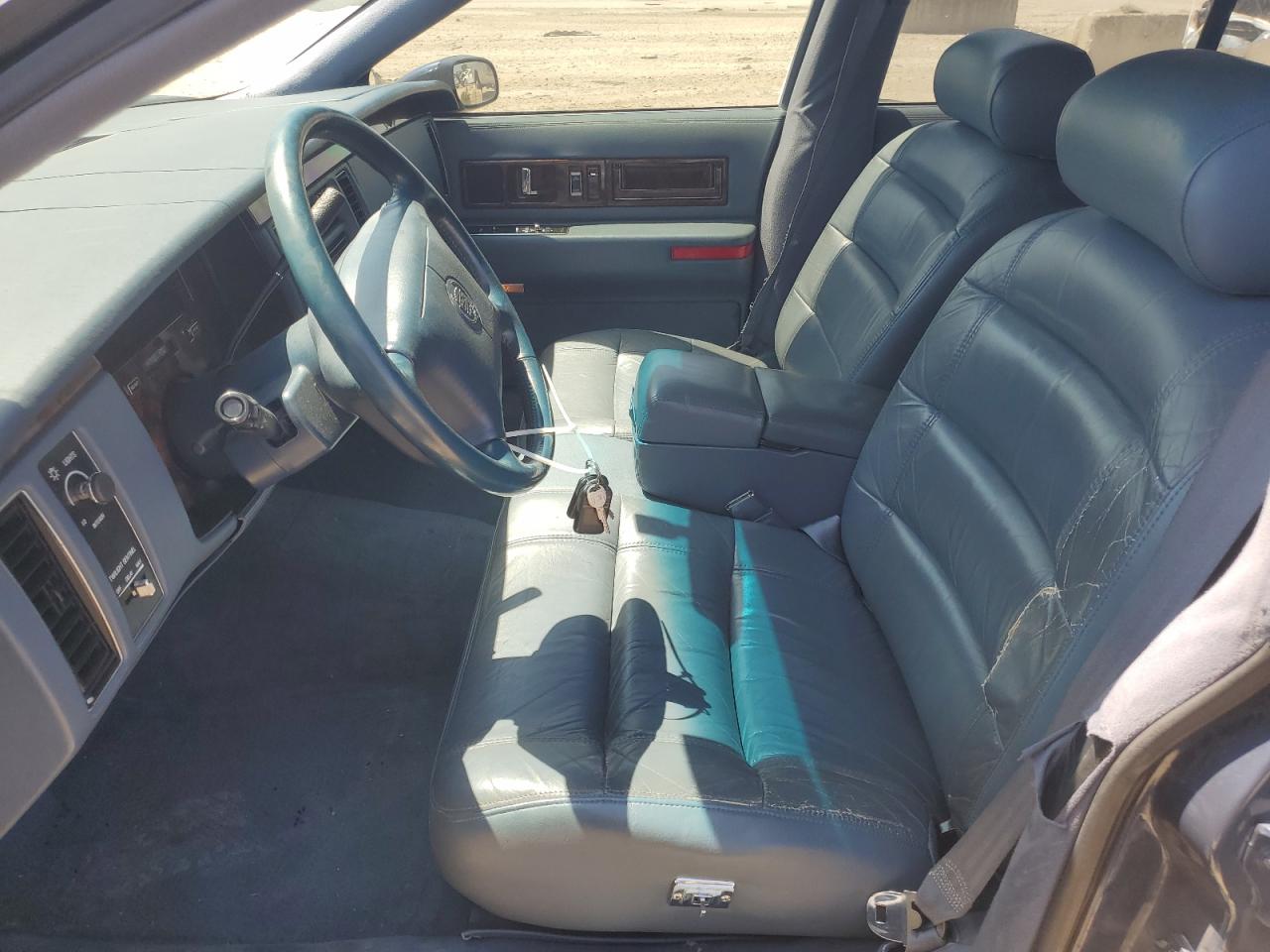 1994 Cadillac Fleetwood Base VIN: 1G6DW52P4RR713955 Lot: 61852175