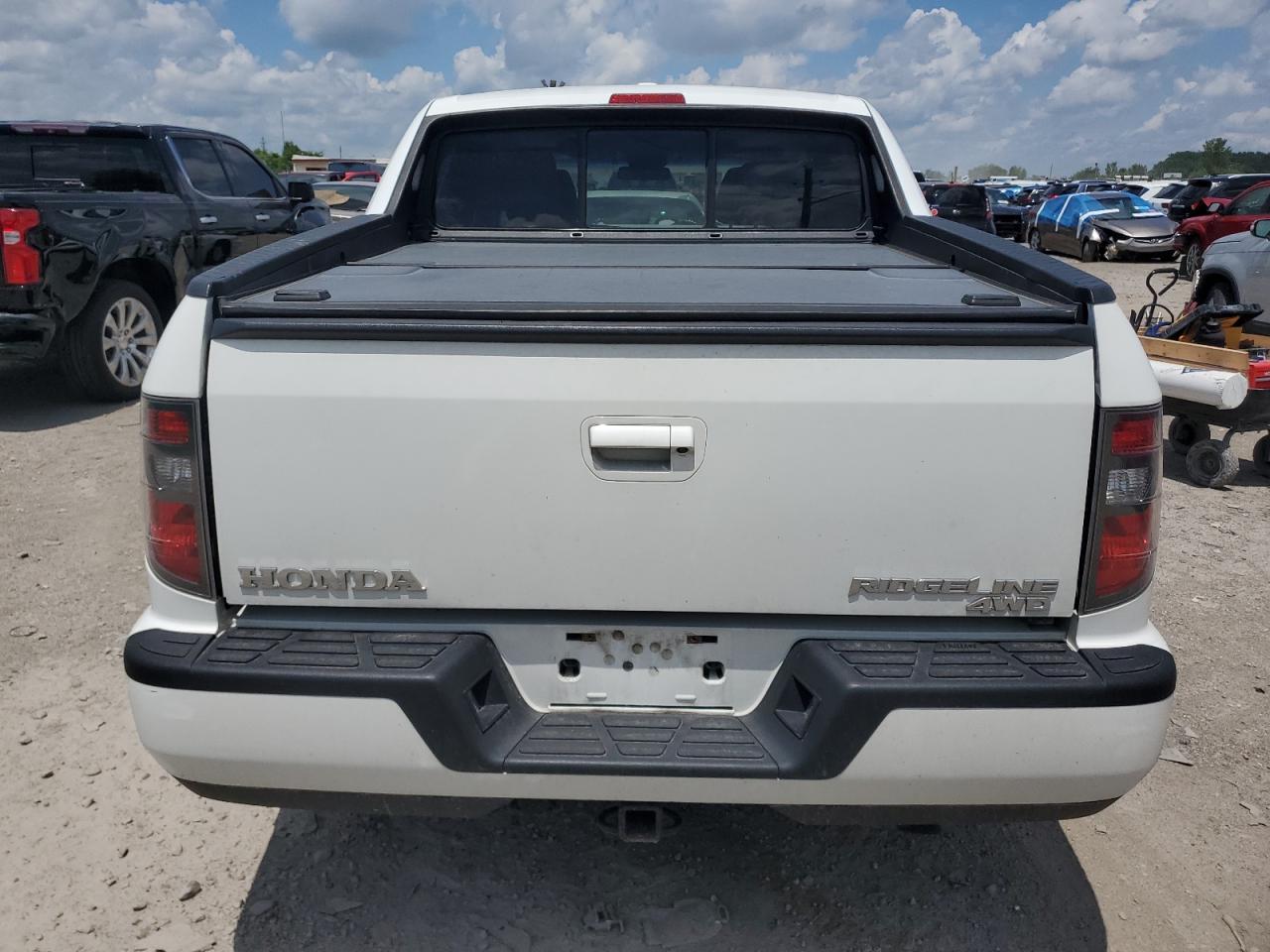 2012 Honda Ridgeline Rtl VIN: 5FPYK1F56CB002709 Lot: 62642495