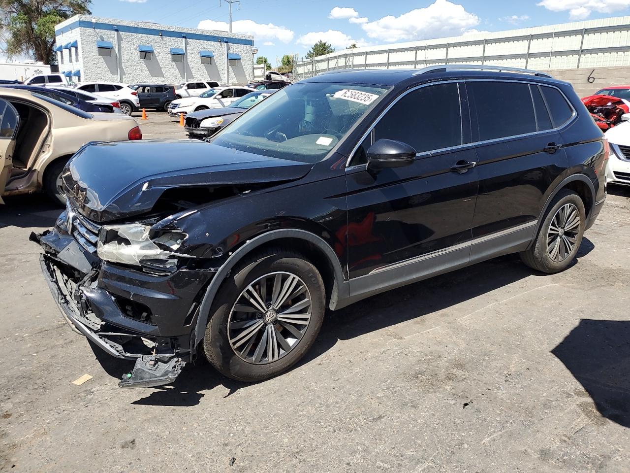 VOLKSWAGEN TIGUAN 2018 VIN 3VV3B7AX3JM005057