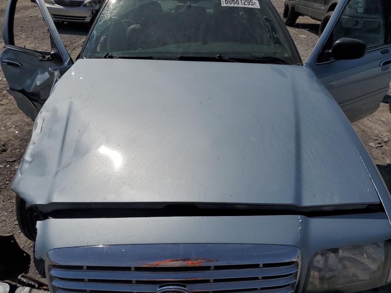 2004 Ford Crown Victoria Lx VIN: 2FAFP74W54X140989 Lot: 60681295