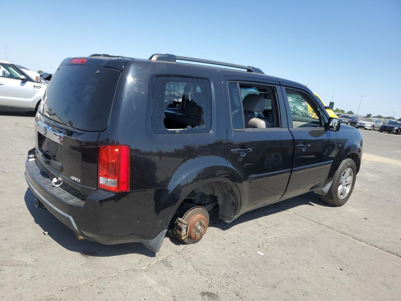 2011 Honda Pilot Exln VIN: 5FNYF4H74BB010433 Lot: 63043845