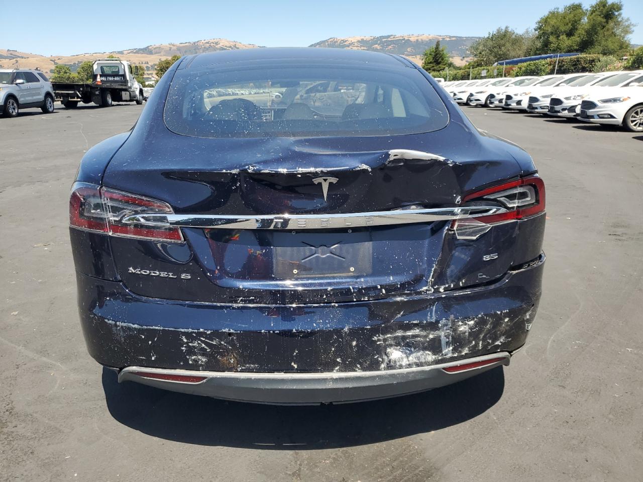 2014 Tesla Model S VIN: 5YJSA1H14EFP44945 Lot: 61503425