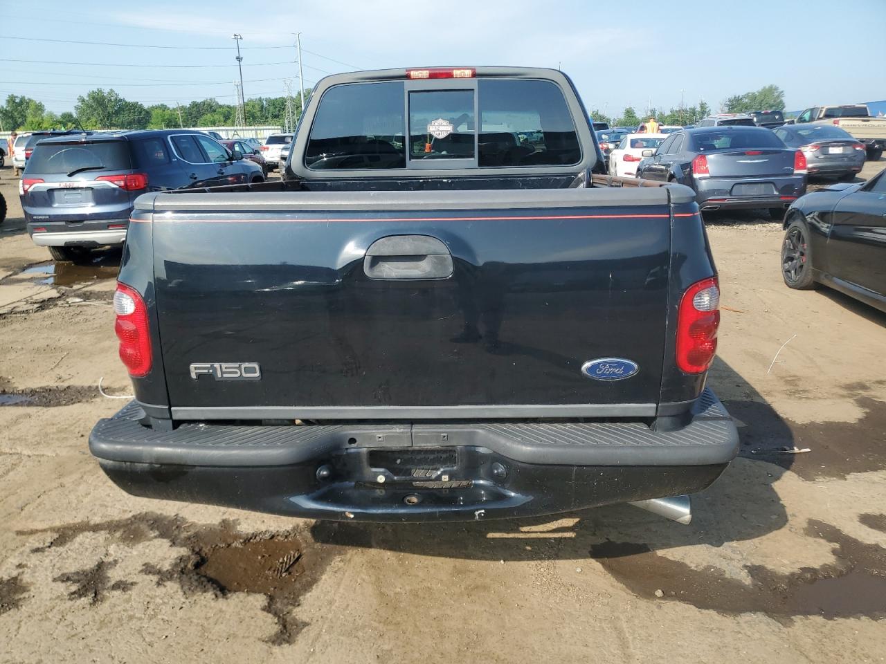 2000 Ford F150 VIN: 2FTRX07L0YCA98549 Lot: 61469475