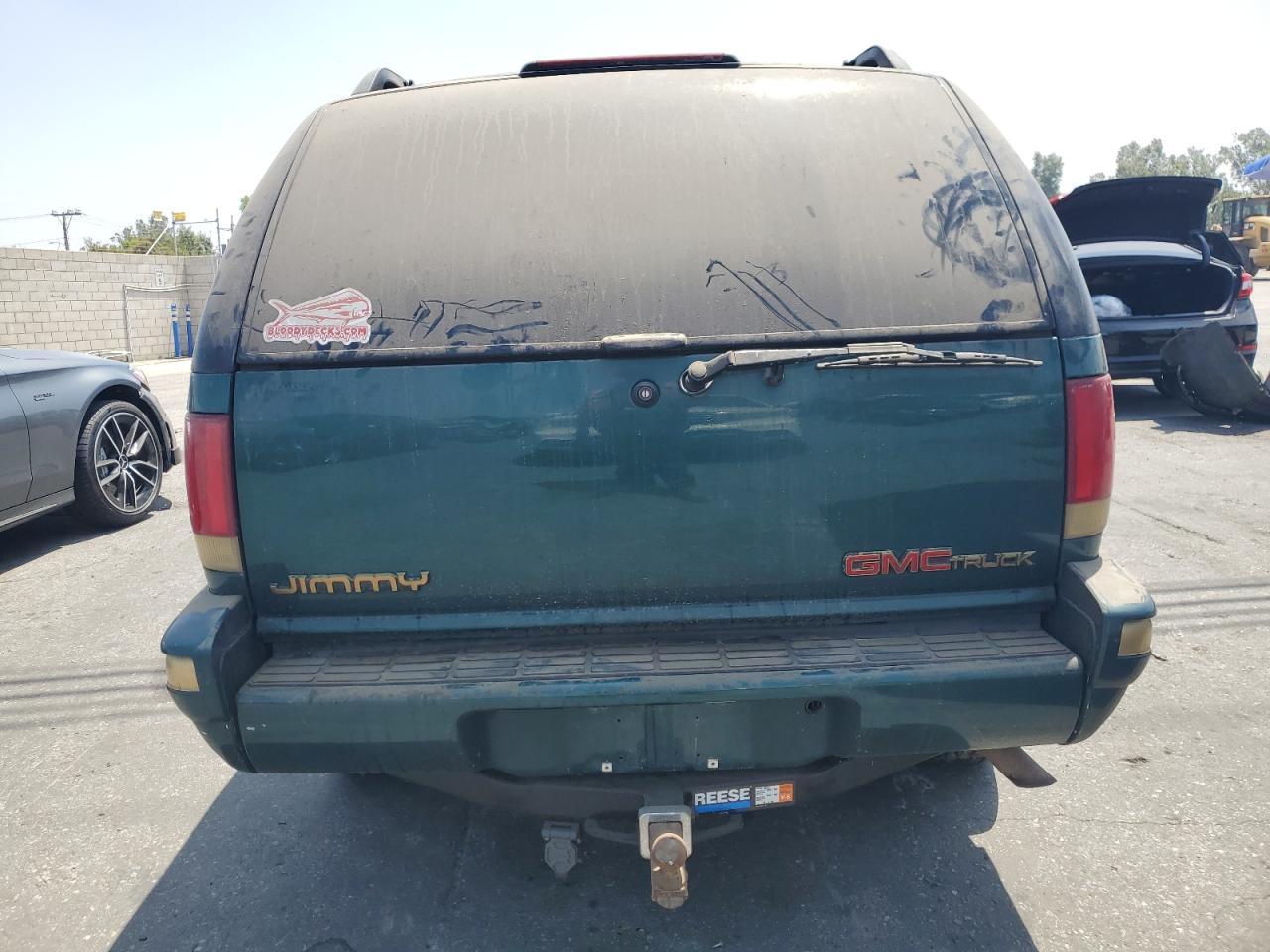 1996 GMC Jimmy VIN: 1GKDT13W8T2562644 Lot: 61973555