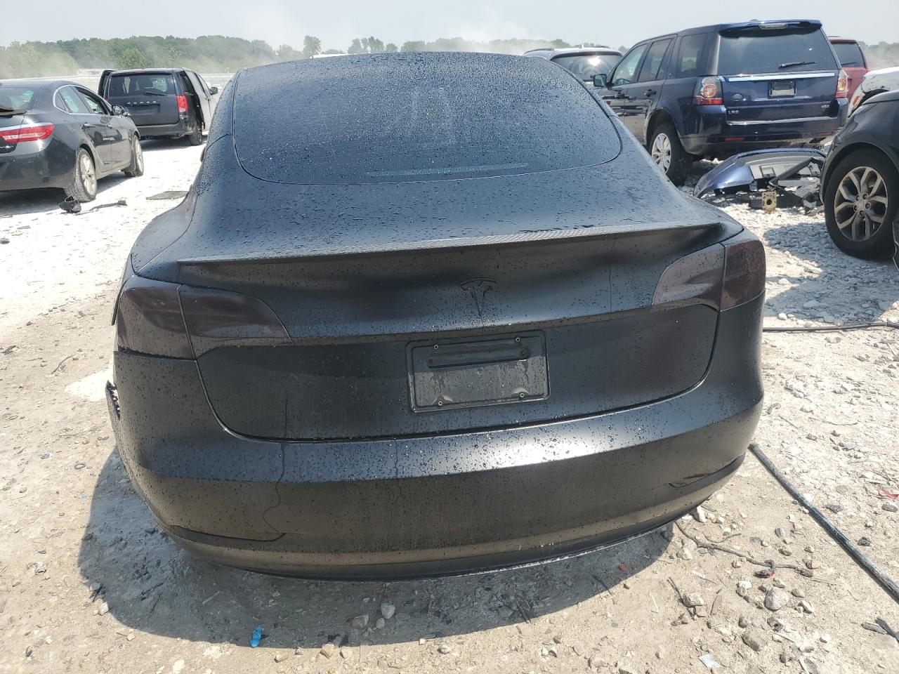 2023 Tesla Model 3 VIN: 5YJ3E1ECXPF582188 Lot: 60716565