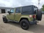 2013 JEEP WRANGLER UNLIMITED SAHARA   à vendre chez Copart MI - FLINT