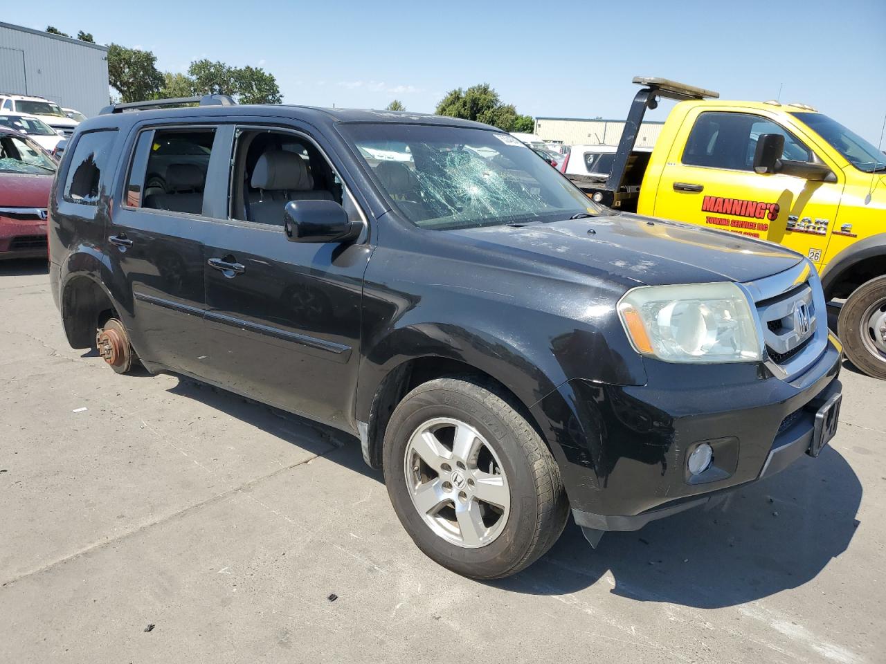 2011 Honda Pilot Exln VIN: 5FNYF4H74BB010433 Lot: 63043845