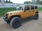 2014 Jeep Wrangler Unlimited Sahara იყიდება Davison-ში, MI - Rollover