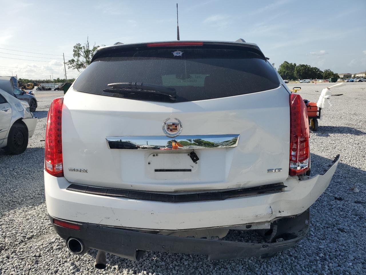 2014 Cadillac Srx VIN: 3GYFNAE32ES571293 Lot: 59782385