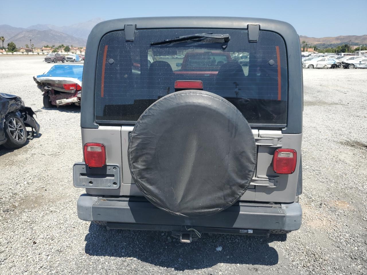 2000 Jeep Wrangler / Tj Se VIN: 1J4FA29P7YP737289 Lot: 61869865