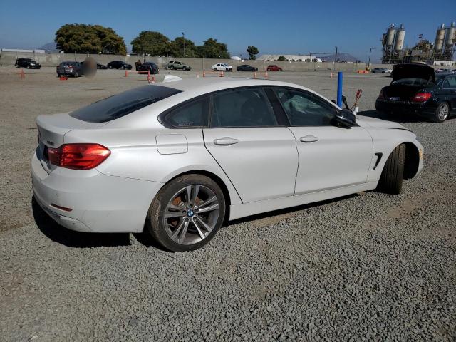  BMW 4 SERIES 2015 Белы
