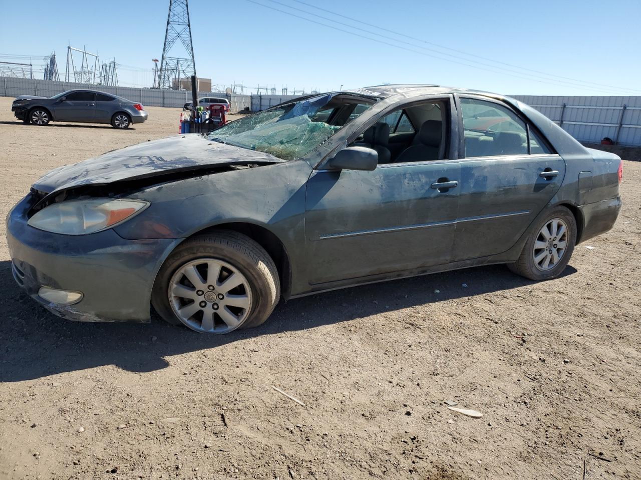 2003 Toyota Camry Le იყიდება Adelanto-ში, CA - Rollover
