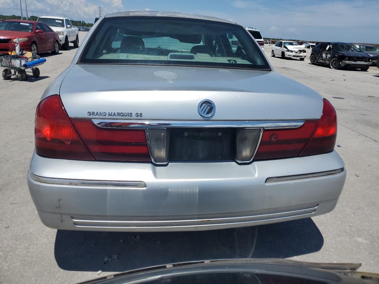 2003 Mercury Grand Marquis Gs VIN: 2MEFM74W43X679748 Lot: 62212025