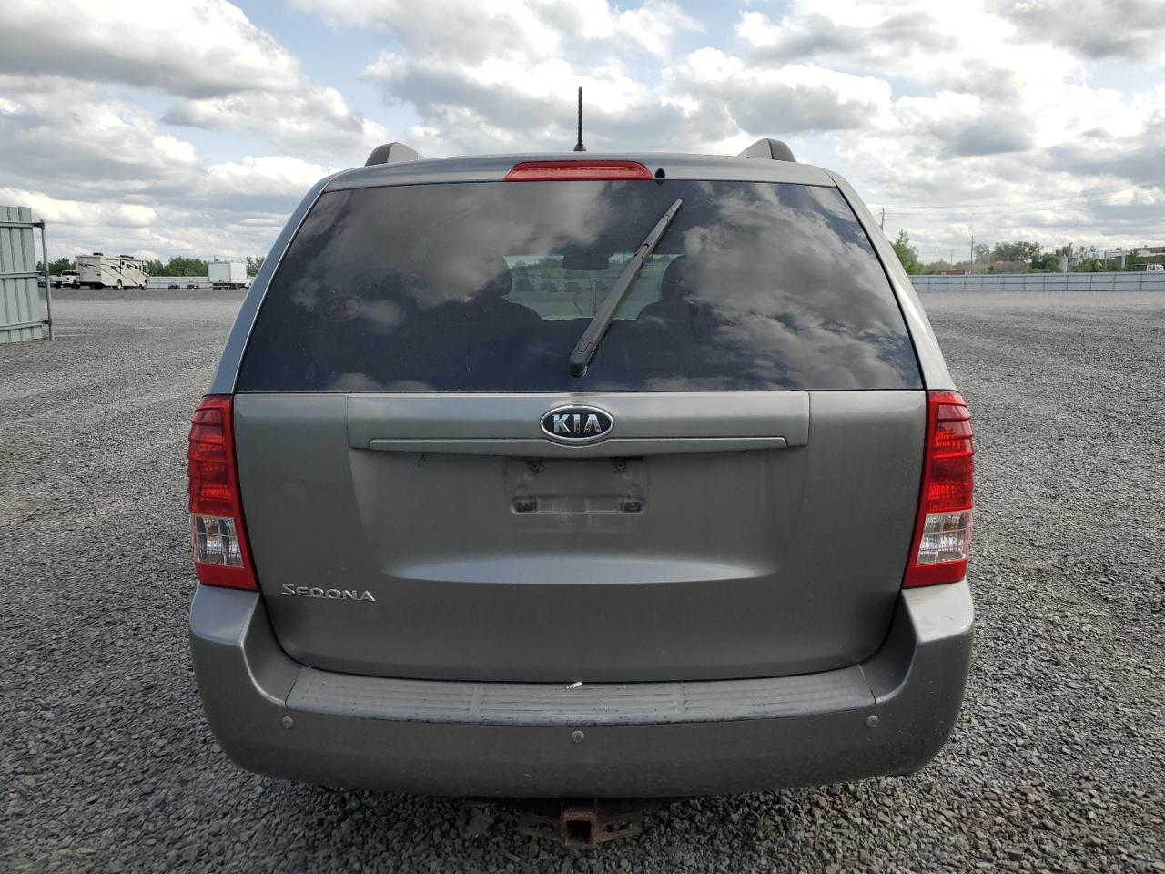 2011 Kia Sedona Lx VIN: KNDMG4C72B6409338 Lot: 61506125