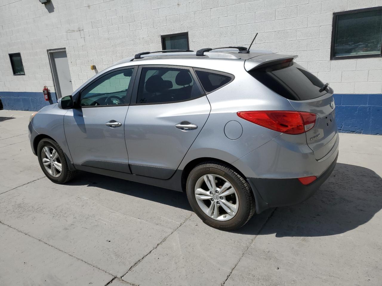 HYUNDAI TUCSON 2012 VIN KM8JUCACXCU542525 фото 2